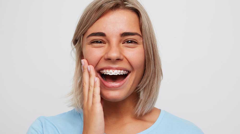 woman smiling after a consultation at the orthodontics