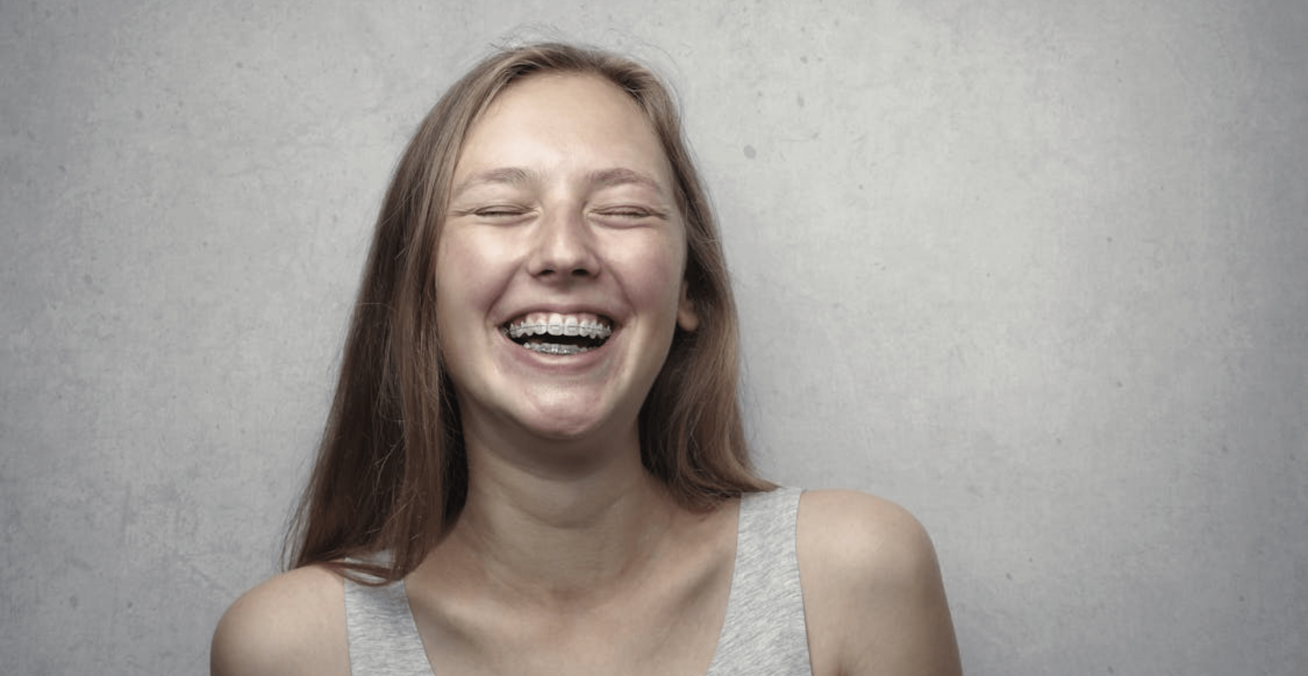 girl with braces smiling at beeston dental centre