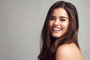 girl smiling with straight teeth