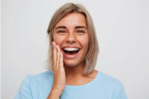 Woman with braces smiling