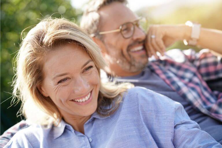 couple smiling after eating good food
